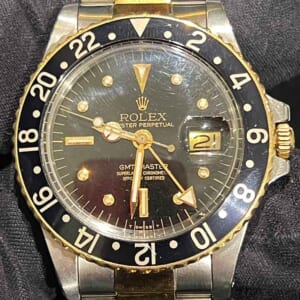 ロレックス GMTマスター 40mm ブラック文字盤 SS K18イエローゴールド 1675/3